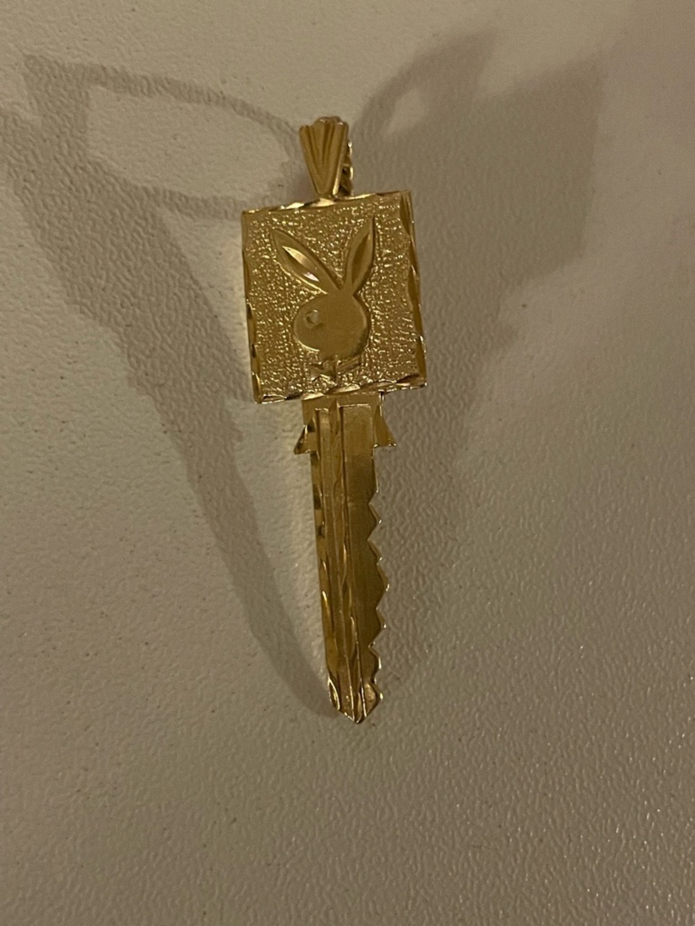 14kt gold vintage rare Michael Anthony gold playboy key pendant.